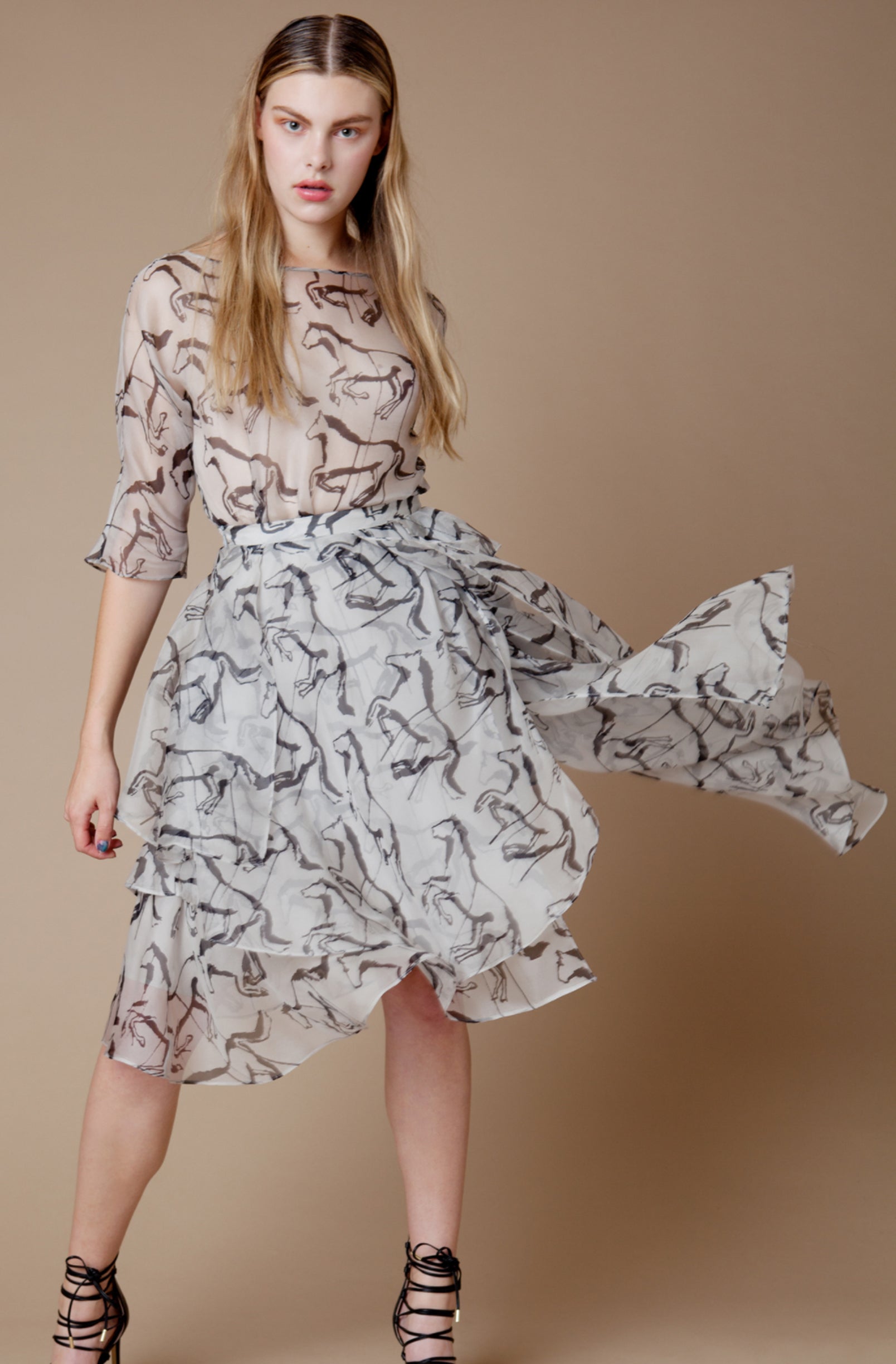 MIRAGE ASYMMETRICAL SKIRT IN HORSE ORGANZA